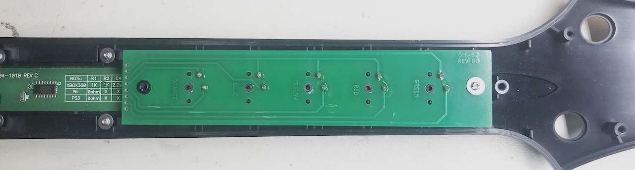 Fret PC Board resting on the fret buttons
