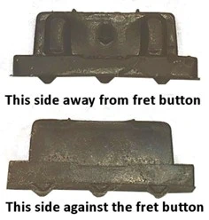 Close-up image of Guitar Hero fret button "rubber bumpers"